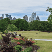 Piedmont Park Meadow with people enjoying the park in springtime